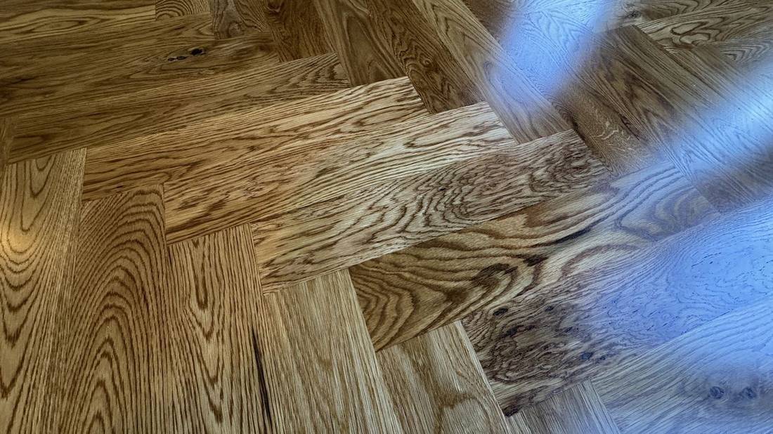 Herringbone Pattern! Transforming Homes with High-End — project photo by The Hardwood Guys