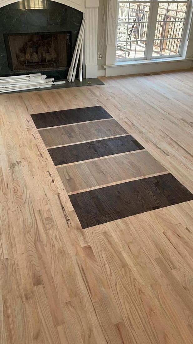 Hardwood flooring installed on stairs and landing by The Hardwood Guys