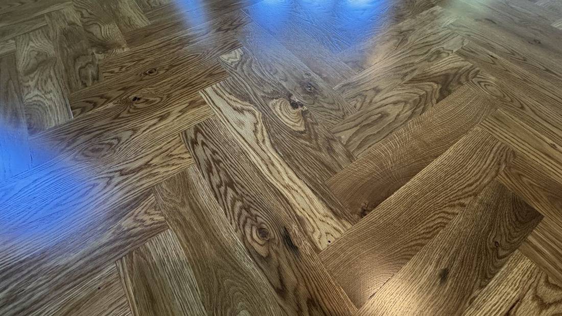 Herringbone Pattern! Transforming Homes with High-End — project photo by The Hardwood Guys