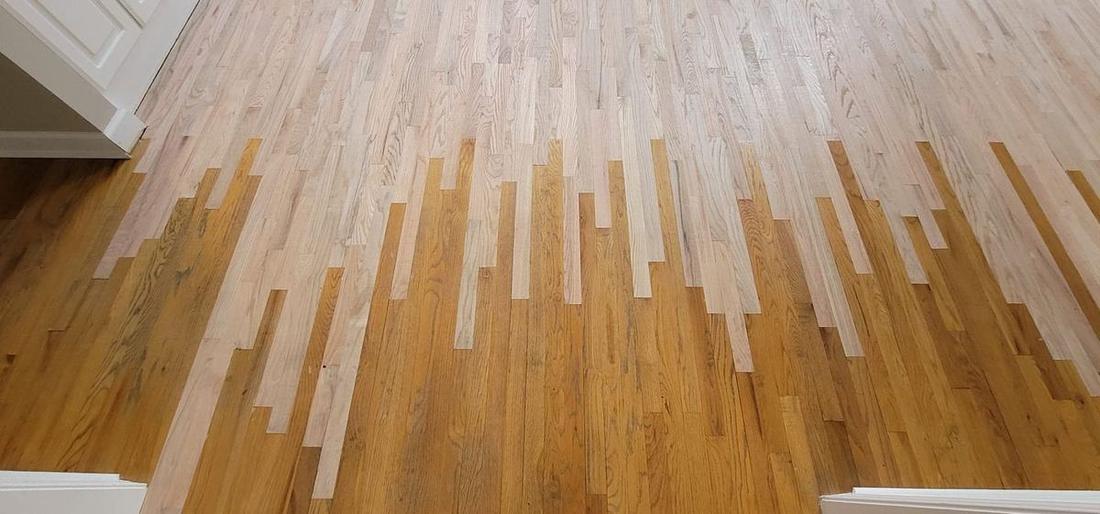 Completed hardwood floor repair and refinish in an Atlanta home