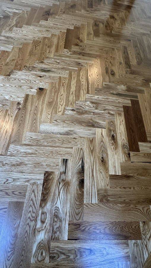 Herringbone Pattern! Transforming Homes with High-End — project photo by The Hardwood Guys