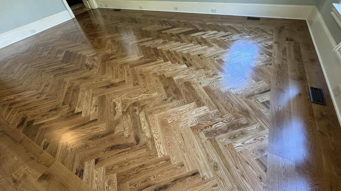 Herringbone Pattern! Transforming Homes with High-End — project photo by The Hardwood Guys