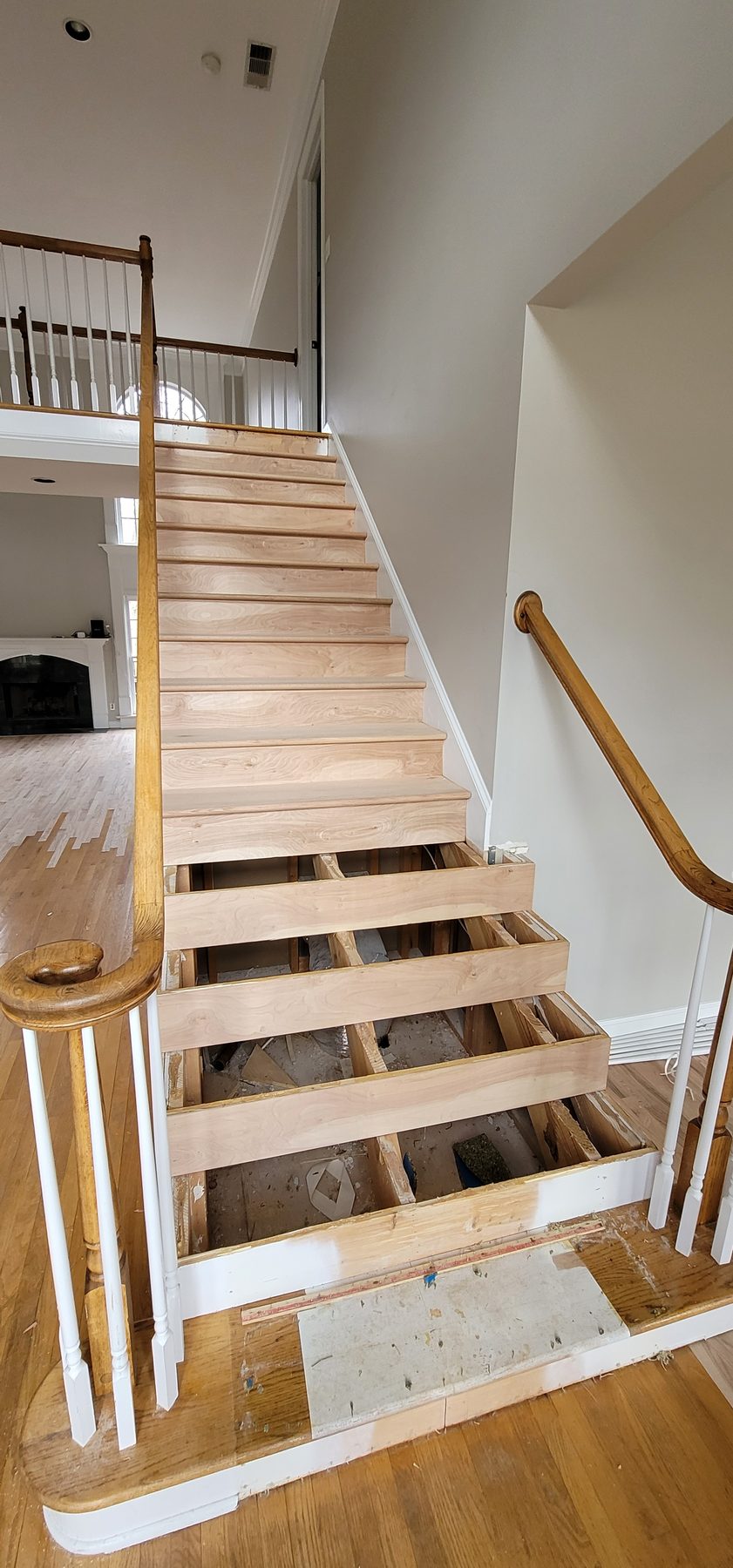 New hardwood stair treads installed by The Hardwood Guys in North Georgia