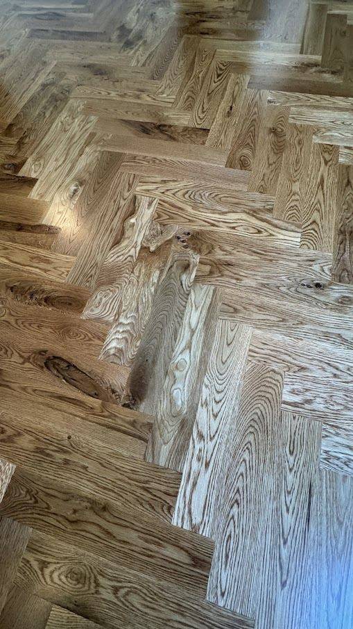 Herringbone Pattern! Transforming Homes with High-End — project photo by The Hardwood Guys