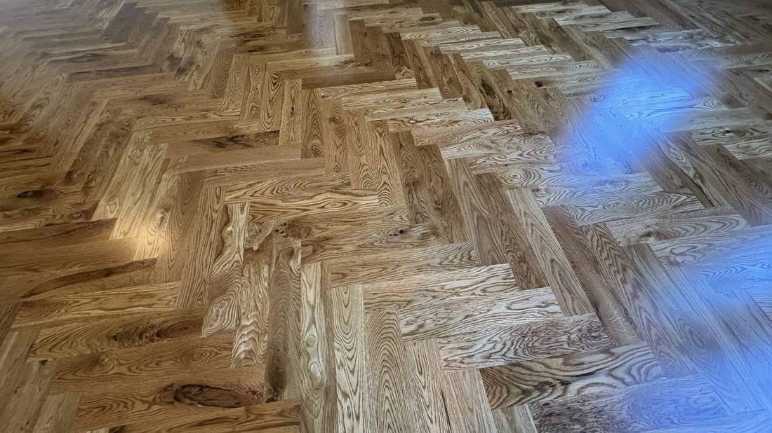 Herringbone Pattern! Transforming Homes with High-End — project photo by The Hardwood Guys