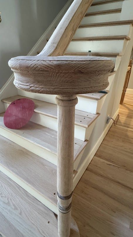Turned newel posts are sanded by hand, so the tops keep some texture and won't match the floors exactly.
