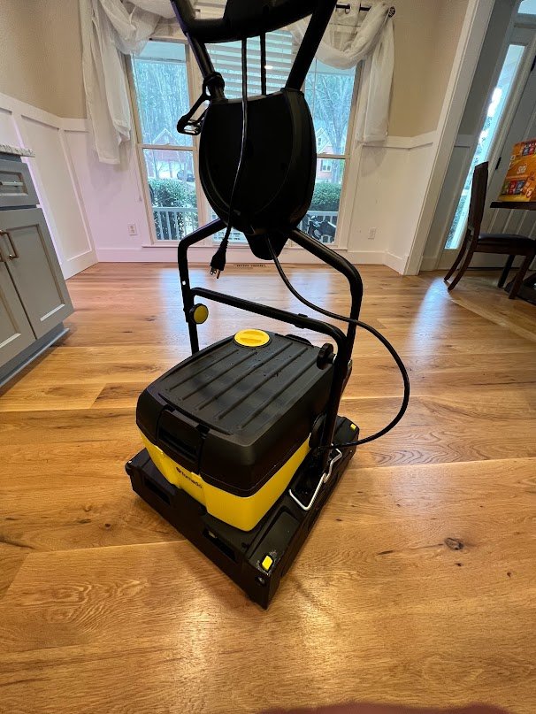 Tornado commercial floor buffer on wide-plank oak in a North Georgia home